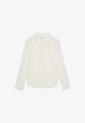 Cream button-up shirt with a pointed collar, long sleeves, and contrasting cuffs. Smooth fabric with a minimalist design, no patterns.