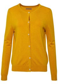 Musztardowo-żółty kardigan wykonany z miękkiej dzianiny, z okrągłym dekoltem, długimi rękawami i zapięciami na perłowe guziki z przodu.