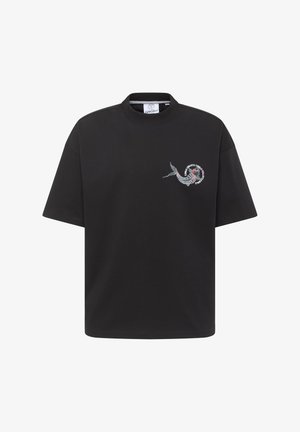 Black short-sleeve t-shirt made of cotton, featuring a colorful embroidered design of a koi fish on the left chest area.