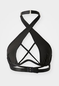 Črn halter bralette z žeščenimi trakovi, izdelan iz gladkega materiala. Ima nastavljiv hrbtni trak z metalnim zaponko in minimalno oblogo.
