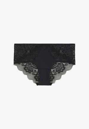 Culotte en dentelle noire pour femmes avec des motifs floraux et des bords festonnés, panneau avant sans couture et détail de petit nœud à la taille.