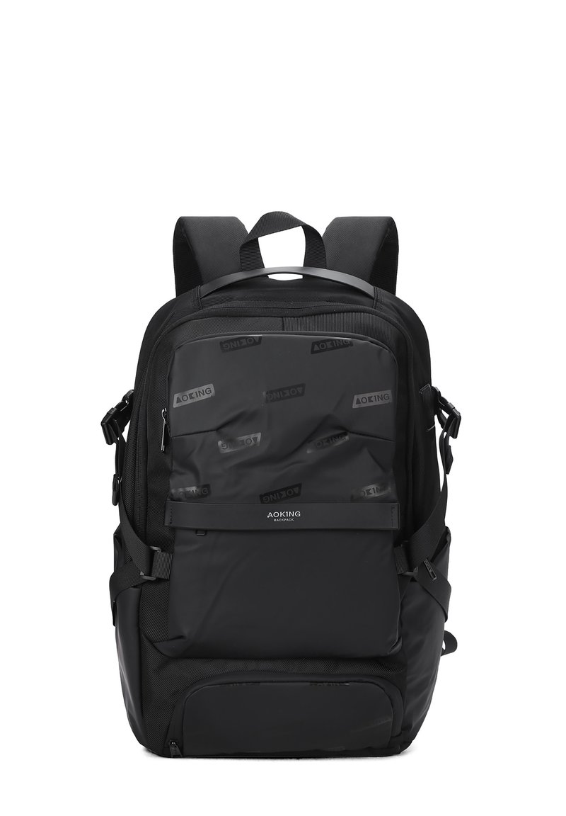Sac à dos noir avec panneaux texturés et accents lisses. Équipé de bretelles ajustables, de plusieurs compartiments zippés et d'un fond renforcé.