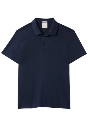 Polo bleu marine à manches courtes avec col et deux boutons, arborant un petit logo discret Calvin Klein sur la poitrine.