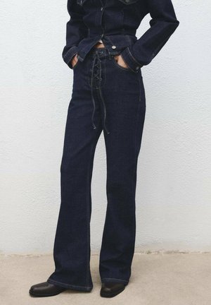 ADULT - Vaqueros a campana - open blauw