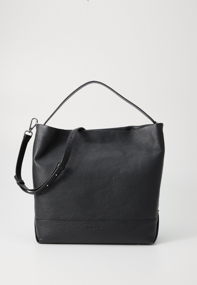 Black leather bag with a textured surface; features a short top handle and an adjustable shoulder strap for versatility.