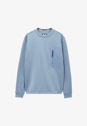 Világoskék, hosszú ujjú pulóver, cipzáras zsebbel a mellrészen és "Weekend Offender" logóval a zsebben.