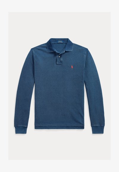 Long-sleeve polo shirt in dark blue cotton fabric, featuring a three-button placket, ribbed collar and cuffs, with a red logo on the chest.