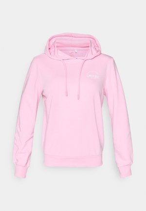 Minkštos rožinės spalvos gobtuvuotas džemperis, su priekinė kišene, raišteliais ir baltu siuvinėtu užrašu „LIMITLESS“ ant krūtinės.