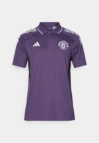 Lilla polyester polo t-shirt med hvide accenter og sorte sidepaneler. Har et Manchester United-logo på brystet og tre stribede ærmer.