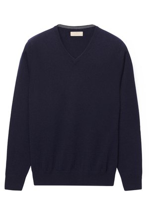 Pull en V bleu marine en matériau doux, doté de manches longues, de poignets côtelés et d'un ourlet côtelé pour une silhouette ajustée.