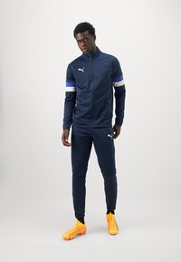 Puma INDIVIDUALRISE SET niebieski