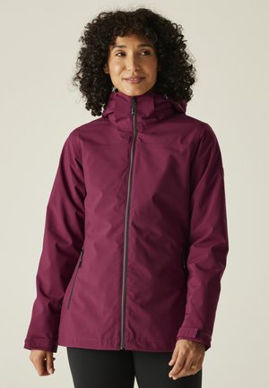 Maroon waterproof jacket with a zip front, adjustable hood, and side pockets. Smooth texture, lightweight design, suitable for outdoor use.