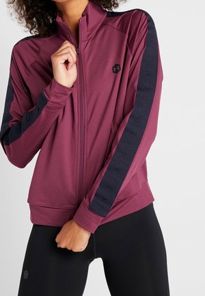 Giacca zip-up bordeaux con accenti neri, dotata di un colletto alto, maniche lunghe e dettagli del logo sulle maniche. Realizzata in tessuto liscio ed elastico.