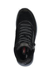 Black suede sneaker with grey laces and zipper detail. A rounded toe and rubber sole complete the design, featuring textured fabric accents.