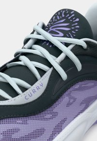 Athletic shoe with a purple mesh upper, black detailing, and light blue laces. Features a textured design and logo on the tongue.