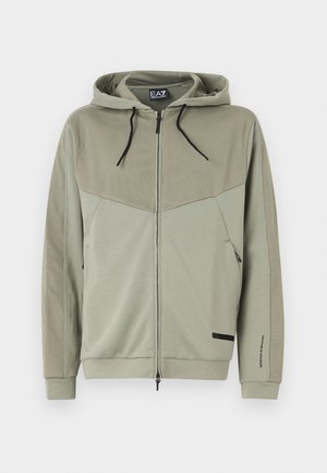Sweatshirt verde com fecho éclair, apresenta uma parte superior em malha texturizada, capuz com cordão e bolsos laterais; possui um painel inferior sólido e detalhe de marca.