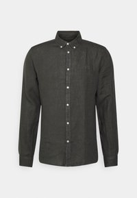 Camisa de lino verde oscuro con cuello abotonado, mangas largas y un sutil logo en el pecho. Cuenta con botones blancos a lo largo del frente.