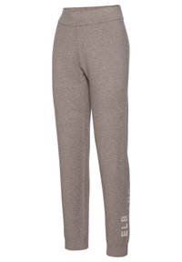 Grijze katoenen joggers met een elastische tailleband, taps toelopende benen en witte bedrukking aan de zijkant. Zachte textuur met een gladde afwerking.