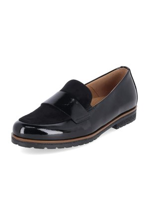 Mocassin pour femmes noires avec dessus en cuir brillant et suède, petit talon, doublure intérieure couleur noisette et semelle en caoutchouc texturée.