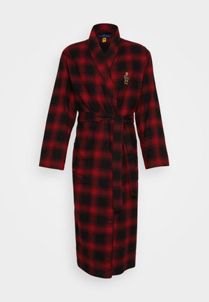 Sarkana un melna krāsu raibs peldmētelis, izgatavots no mīkstas auduma. Tas ir ar garām piedurknēm, sasienams un tam ir divas priekšējās kabatas.