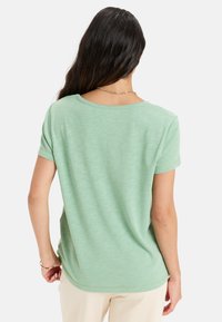 Roxy FLOWING - T-shirt basic - green