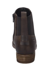 Brązowe skórzane botki za kostkę z elastycznymi bocznymi panelami, tylnym zamkiem i teksturowanym obcasem. Podeszwa posiada poziome paski dla lepszej przyczepności.