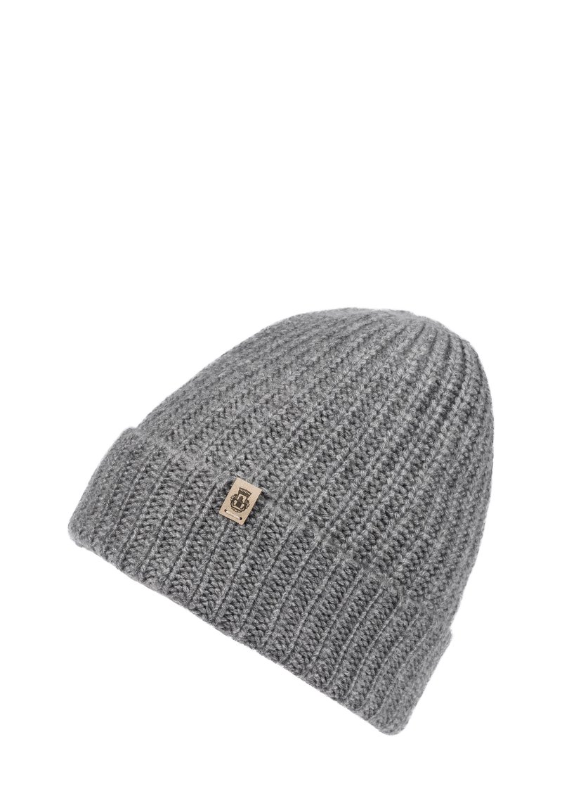 Gray ribbed knit beanie with folded cuff and a small beige tag featuring a black logo on the cuff.