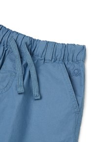 Lichtblauwe shorts met een elastische tailleband, trekkoord, zijzakken en geborduurd logo-details. Glad stof met een matte afwerking.
