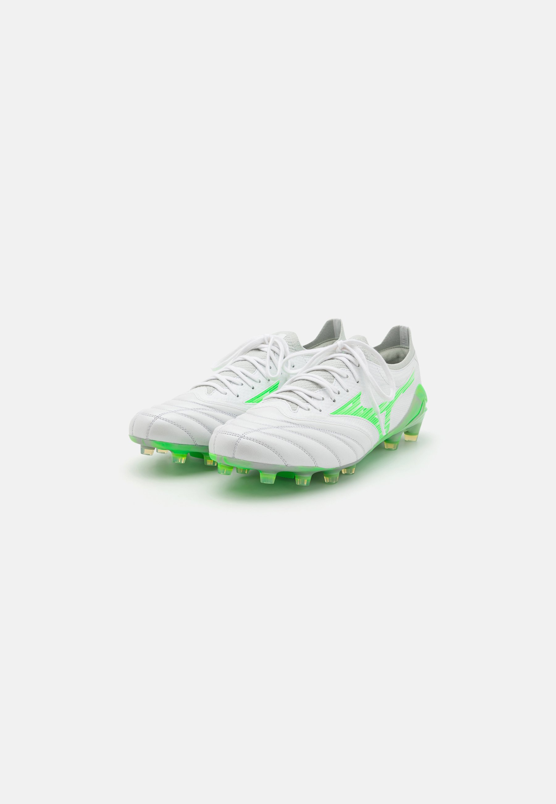 green and white football cleats