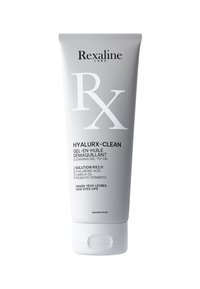Weißer Tubus mit grauen Akzenten, mit Etiketten "Rexaline Labs" und "Hyalurx-Clean". Enthält eine Reinigungsgel-zu-Öl-Formel mit glattem Finish.