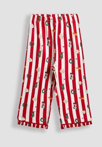 Sarkanie un balti svītraini pidžamu bikses ar svinīgiem rakstiem, tostarp vainagiem, zeķēm un sniega pārslām, ar rufflētu apakšmalu.