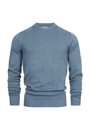 Blauwe trui gemaakt van een gestructureerde brei stof, met een chevront patroon, lange mouwen en een geribbelde ronde halslijn en zoom.