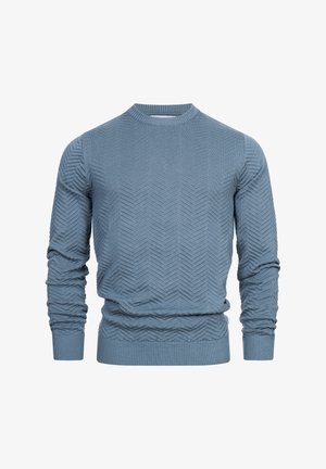 Sininen neulepaita, joka on valmistettu teksturoidusta neulekankaasta, jossa on viistekuvio, pitkät hihat ja ribbireunus kaula-aukossa ja helmassa.