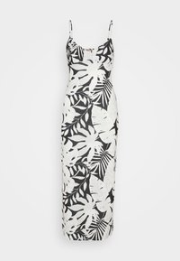 Robe longue sans manches avec fines bretelles, avec un motif de feuilles tropicales noir et blanc et un décolleté en V.