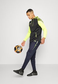 JAKO ALLROUND - Jogginghose - marine/neongelb