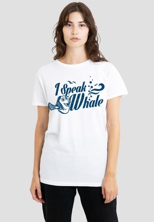 White cotton t-shirt with short sleeves featuring a blue graphic design that reads "I Speak Whale," depicting a smiling fish and bubbles.