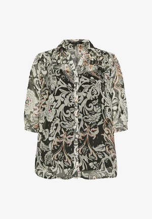 Mustavalkoinen kukallinen pusero, jossa on puolihihat, napitettava etuosa ja kevyt, läpikuultava kangas. Sisältää hillittyä kuosia ja röyhelöyksityiskohtia.