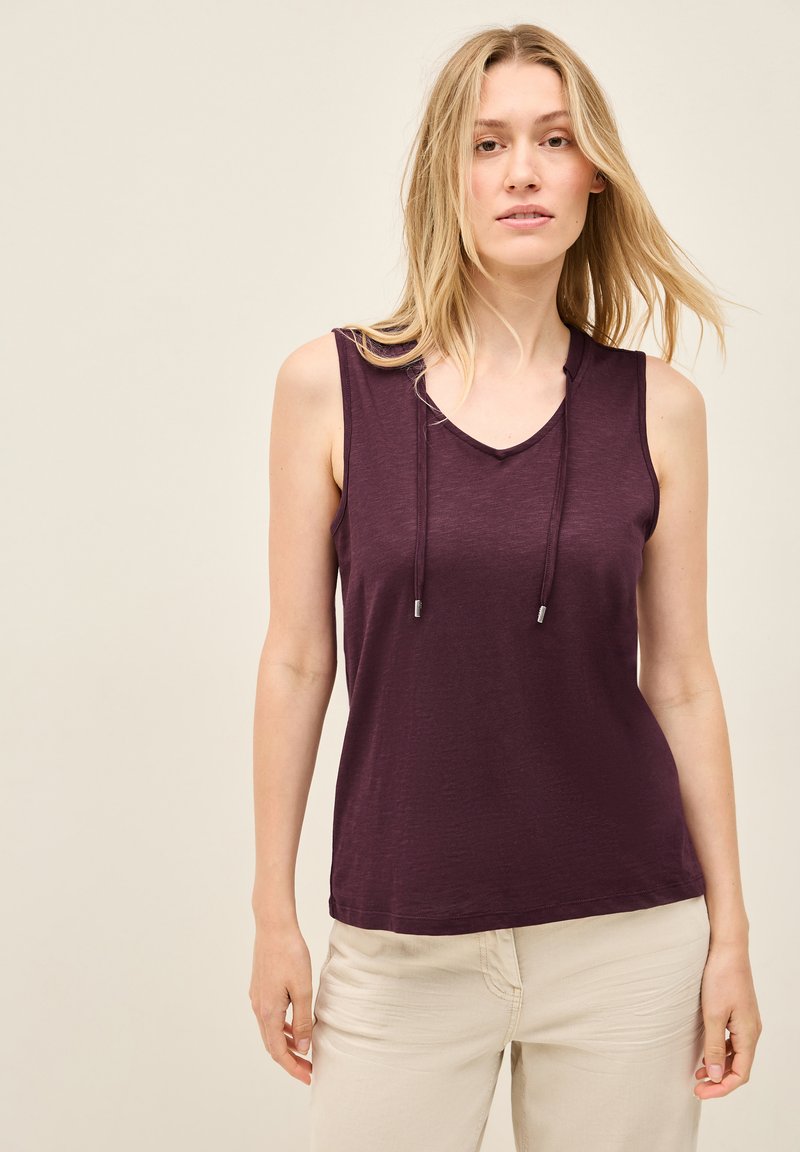 Haut sans manches en forme A de couleur violet profond, doté d'un décolleté en V et d'un cordon de réglage, confectionné en tissu doux et léger.