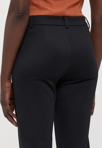 ONLY Tall ONLPEACH LIFE FLARED  - Trousers - black
