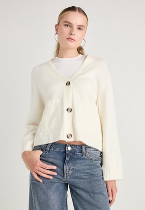 POCKET CARDIGAN - Adīta jaka - gardenia