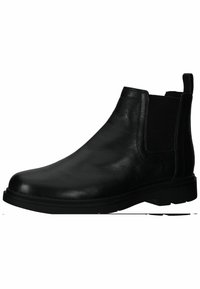 Stivaletti Chelsea neri in pelle con pannelli elastici ai lati, punta arrotondata e superficie texturizzata. Suola in gomma vivace per aderenza e durata.