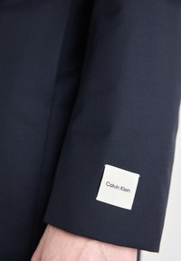 Calvin Klein TRAVEL TECH CARCOAT - Cappotto invernale - calvin navy