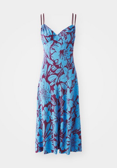 Vestido sem mangas em estampado floral azul sobre um fundo roxo intenso; apresenta alças finas ajustáveis e um corte descontraído.