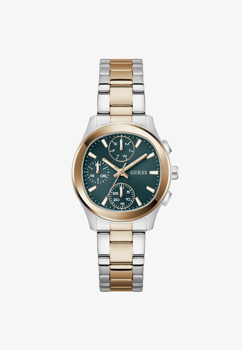 Montre-bracelet deux tons en métal avec maillons dorés et argentés, cadran vert foncé, trois sous-cadrans, aiguilles et index dorés, marque Guess.