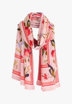 Jasnoróżowy szalik z czerwonymi i fioletowymi wzorami kwiatowymi oraz koralowym, paskowanym brzegiem, luźno ułożony i złożony.