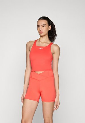 TRAIN ASYMMETRICAL STRAP TANK - Felső - energy red