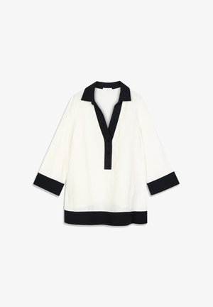 Túnica blanca con cuello y puños negros. Presenta una tapeta con cuatro botones y un corte relajado. Confeccionada con una tela ligera.