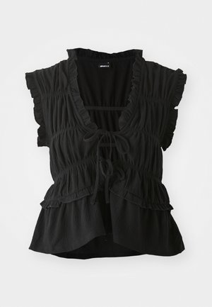 Črna majica s kratkimi, nabrano nabranimi rokavi, V-izrezom, gubanjem, prilagodljivim vezanjem spredaj in plastnim nabranim robom. Lahka tkanina.