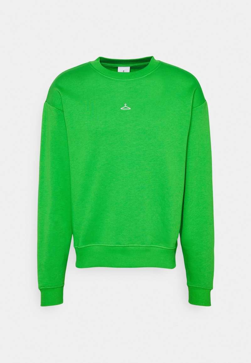 Sweat-shirt à manches longues vert vif avec poignets et ourlet côtelés, arborant un petit motif blanc de cintre centré sous l'encolure.