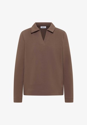 Brązowa bluzka z długim rękawem, z dekoltem w serek i kołnierzykiem. Miękka, teksturowana tkanina z prążkowanymi mankietami i dołem. Na dekolcie widoczna metka.